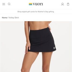 Black VUORI volley skirt. Size Large. (Size chart attached).